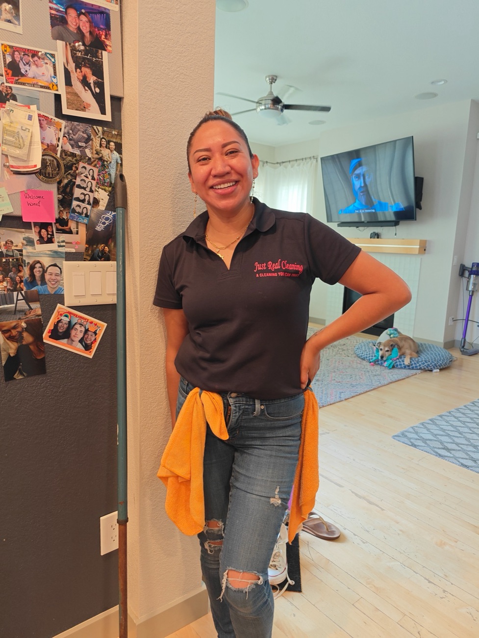 Veronica Acevedo, owner of Just Real Cleaning, smiling in a home.